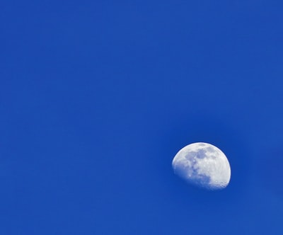 full moon on blue sky